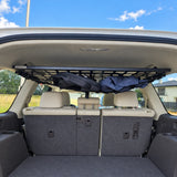 Universal-Netz unter dem Roof Shelf